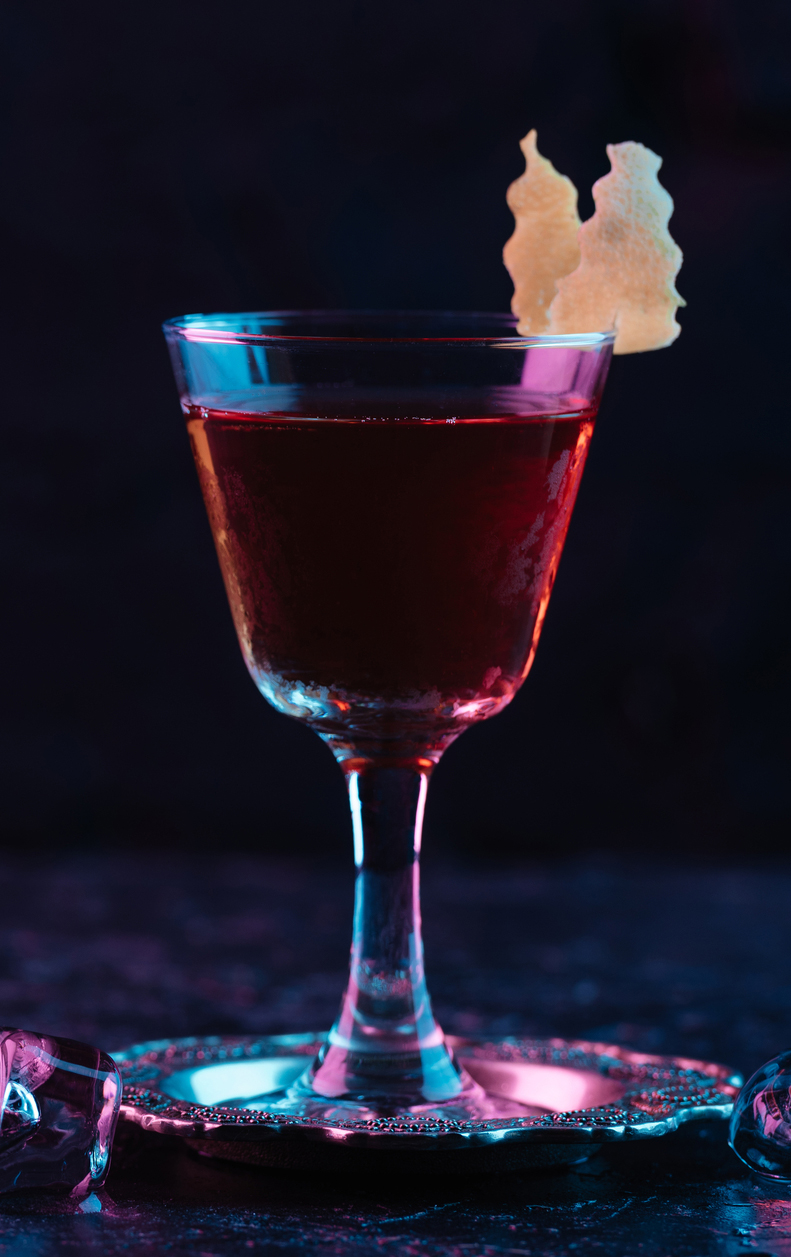 Kola Cransiss cocktail in glass with garnish